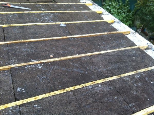 Pose d'isolation entre chevrons par l'extérieur